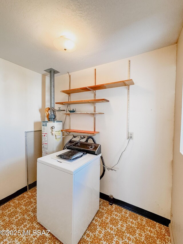 281 E Walker St, Benson, AZ 85602 - laundry area featuring water heater and washer / dryer