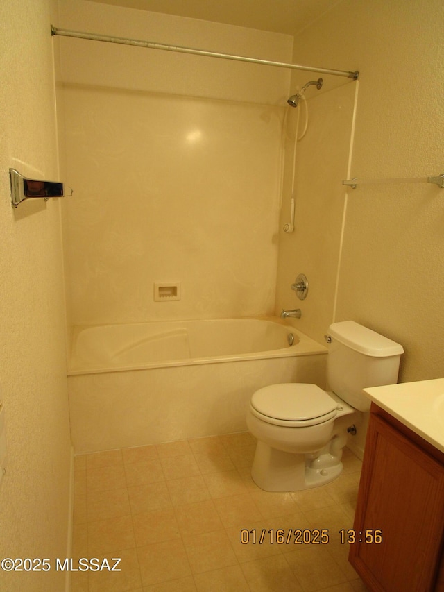 full bathroom featuring toilet, vanity, and bathing tub / shower combination