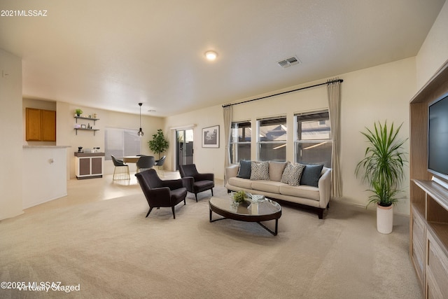 living room with light carpet