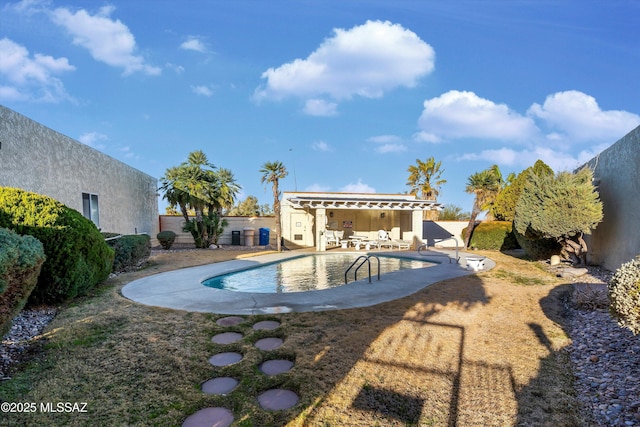 view of swimming pool with a patio area