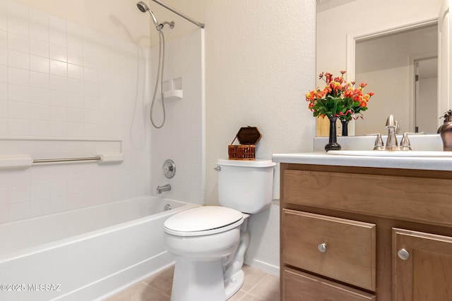 full bathroom featuring toilet, tile patterned floors, washtub / shower combination, and vanity