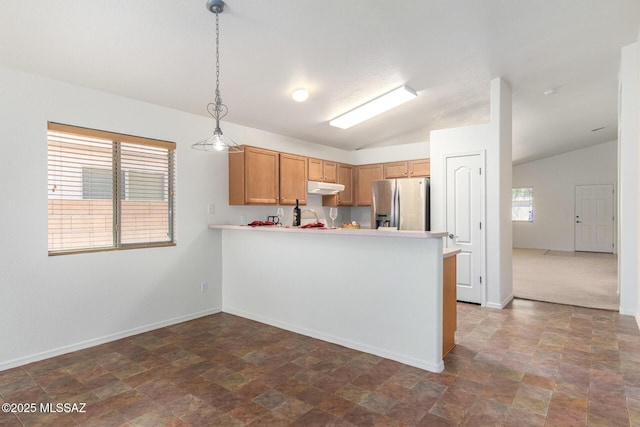 kitchen with kitchen peninsula, lofted ceiling, stainless steel refrigerator with ice dispenser, and pendant lighting