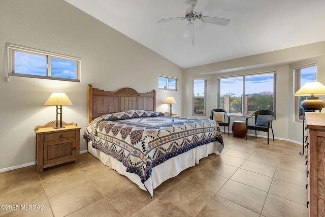 bedroom with ceiling fan, light tile patterned floors, and vaulted ceiling