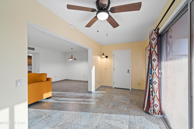 entrance foyer featuring baseboards, visible vents, and a ceiling fan