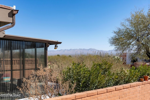 exterior space featuring a mountain view