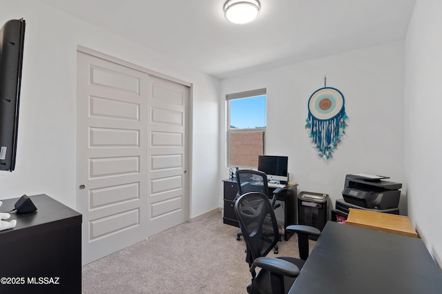 home office with carpet flooring