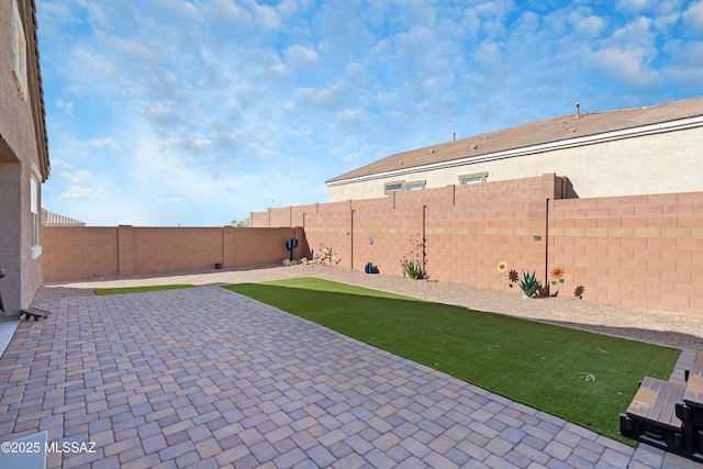 view of patio with a fenced backyard