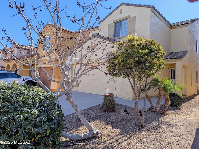 view of front of home with a garage