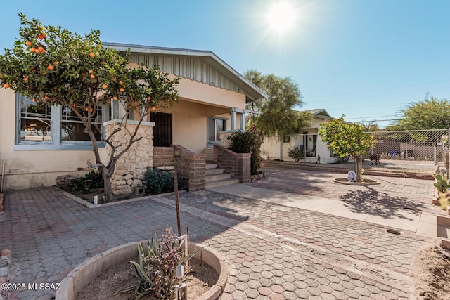 view of front of house featuring a patio area