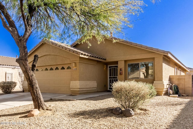 view of front of property with a garage