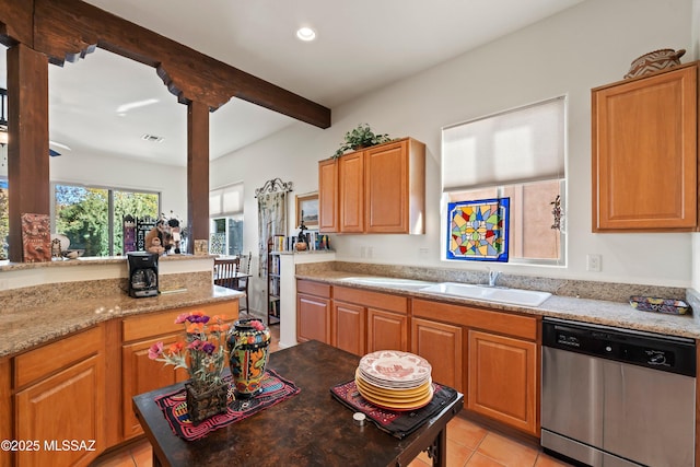 kitchen featuring light tile patterned floors, sink, dishwasher, light stone countertops, and beamed ceiling