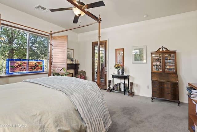 carpeted bedroom with ceiling fan