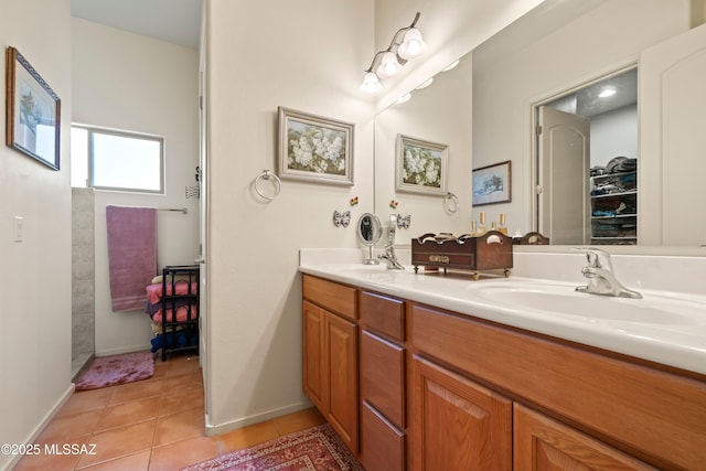 bathroom featuring vanity and tile patterned flooring