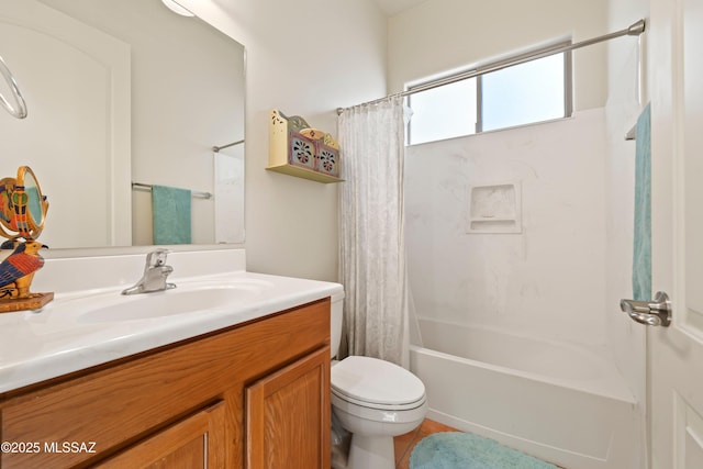 full bathroom featuring toilet, vanity, and shower / tub combo with curtain