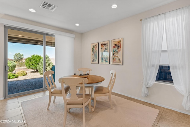 view of tiled dining space