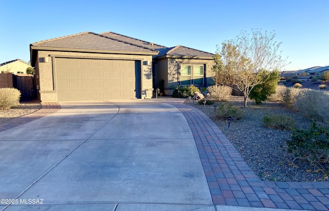 ranch-style house featuring a garage