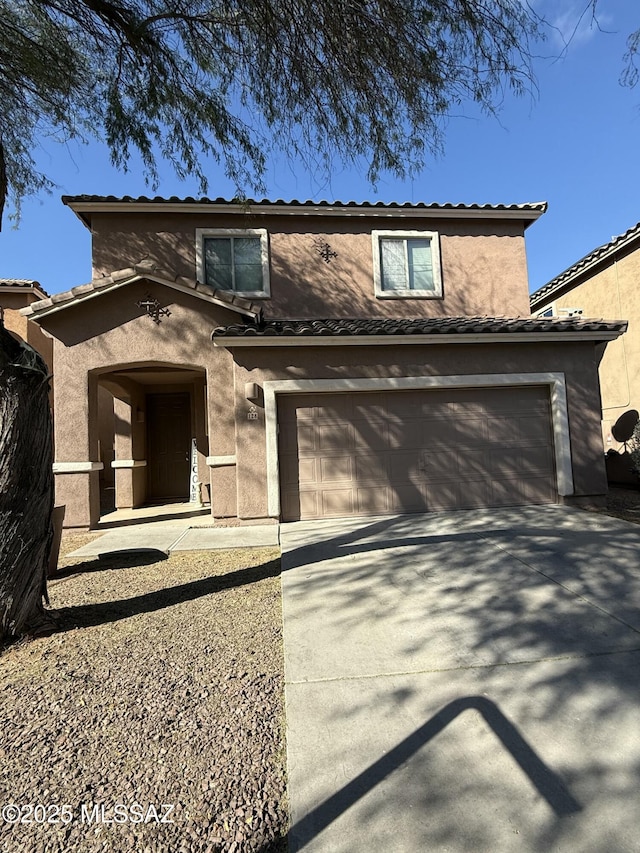 view of front of home with a garage