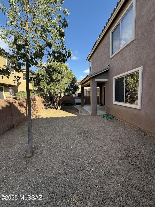 view of yard with a patio area