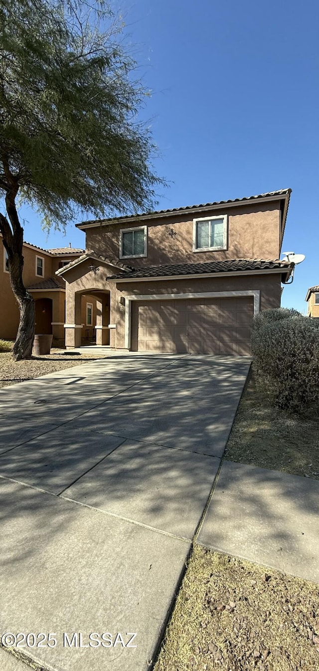 view of front of home with a garage