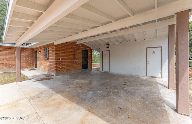 view of patio / terrace featuring a carport