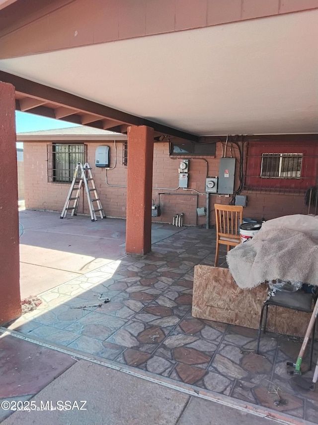 view of patio featuring electric panel