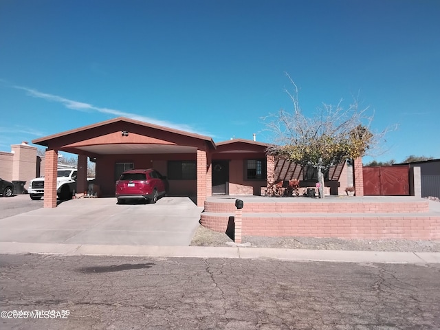 view of front of house with a carport