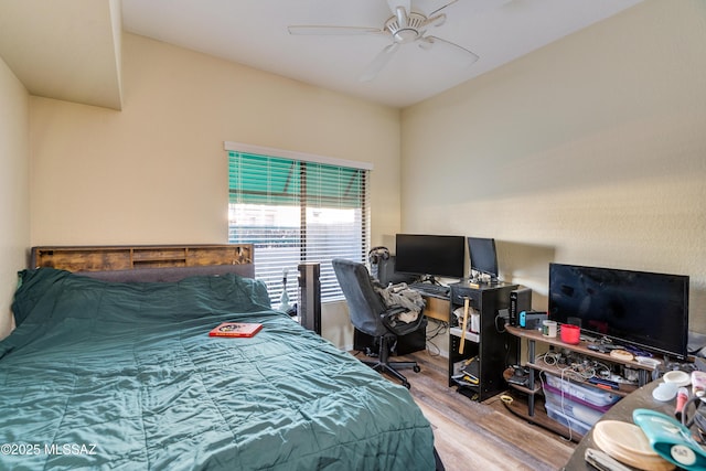 bedroom with ceiling fan and wood finished floors