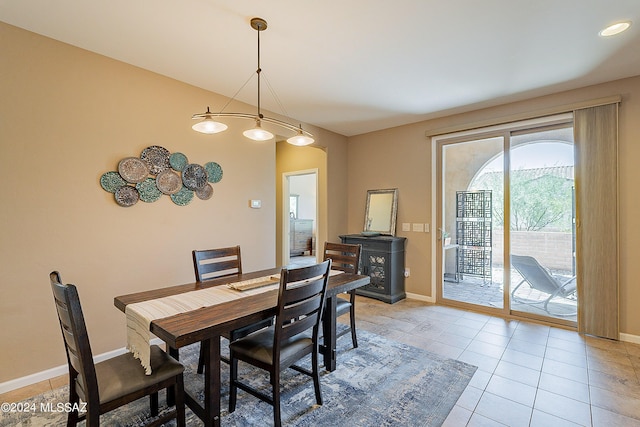 dining area with light tile patterned floors