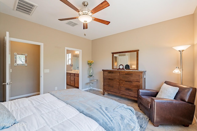 bedroom with sink, ceiling fan, and connected bathroom