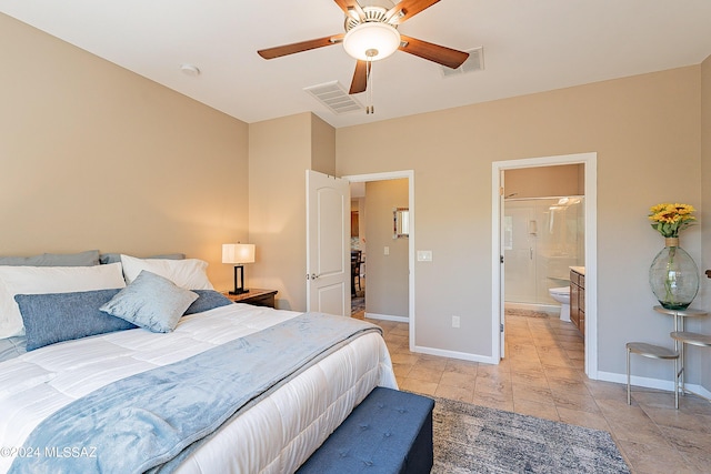 bedroom with ceiling fan, connected bathroom, and light tile patterned flooring