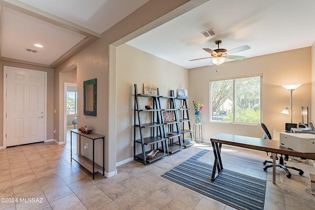 office space featuring ceiling fan and light tile patterned floors