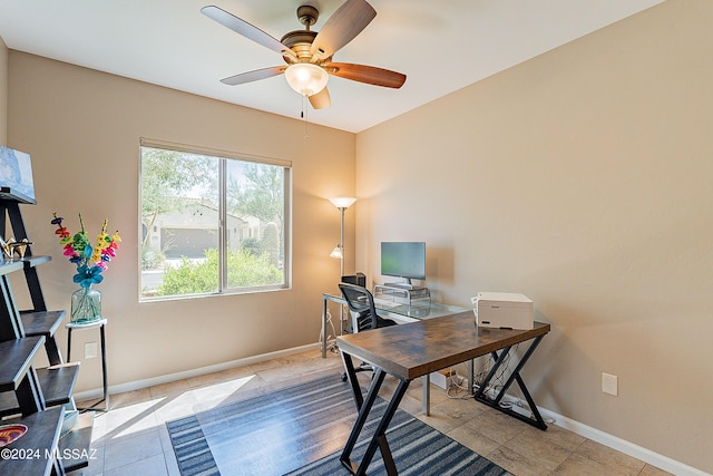 office area featuring ceiling fan and light tile patterned floors