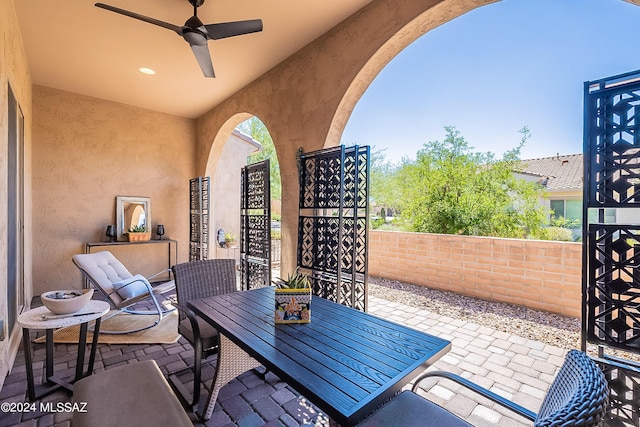 view of patio with ceiling fan