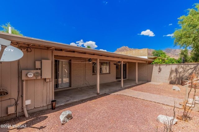 back of house with a patio area