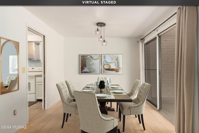 dining space featuring light hardwood / wood-style floors