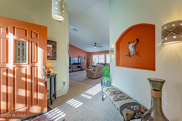 corridor featuring high vaulted ceiling