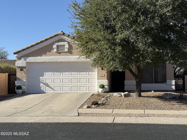 view of front of home with a garage