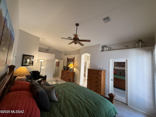 carpeted bedroom with a closet, ceiling fan, and lofted ceiling