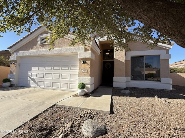 view of front of home with a garage