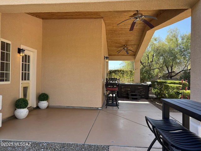 view of patio with ceiling fan