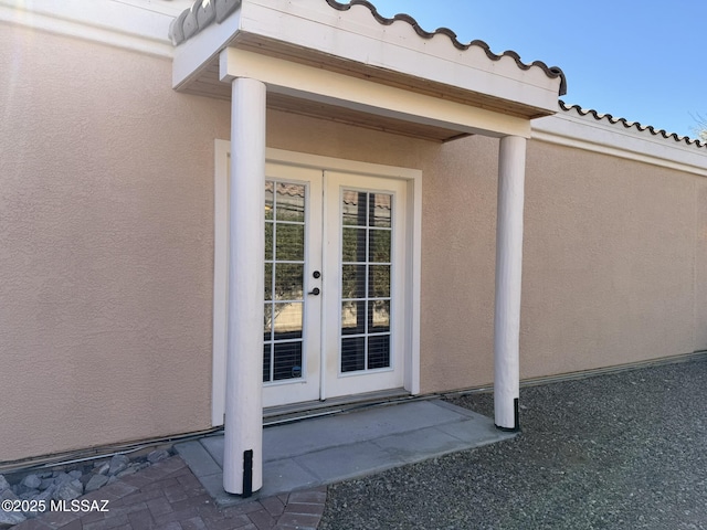 doorway to property with french doors