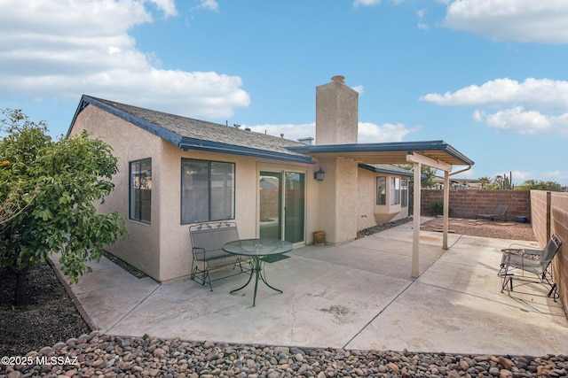 rear view of house with a patio area