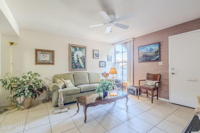 tiled living room with ceiling fan