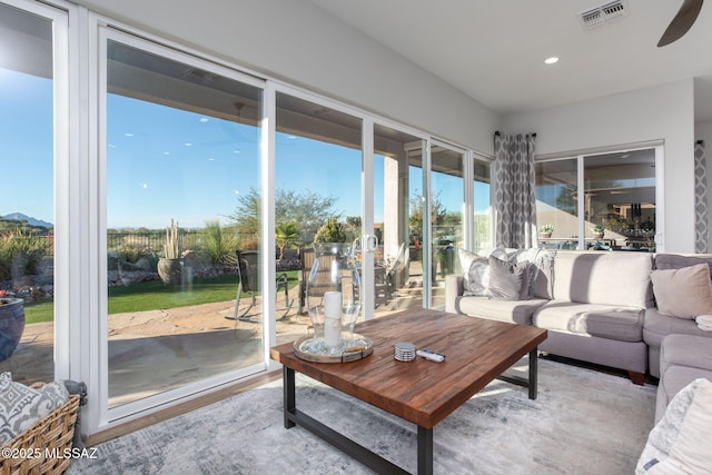 sunroom / solarium featuring visible vents