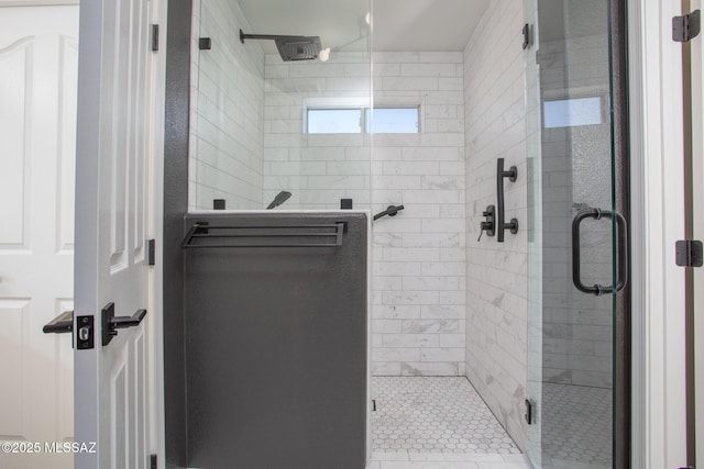 bathroom featuring a shower stall