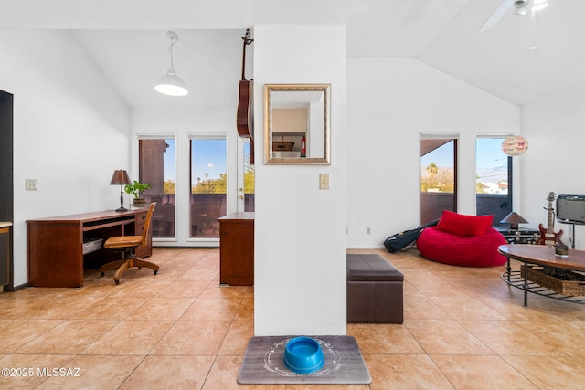 office featuring vaulted ceiling, ceiling fan, and light tile patterned floors