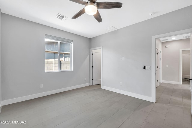 spare room featuring ceiling fan