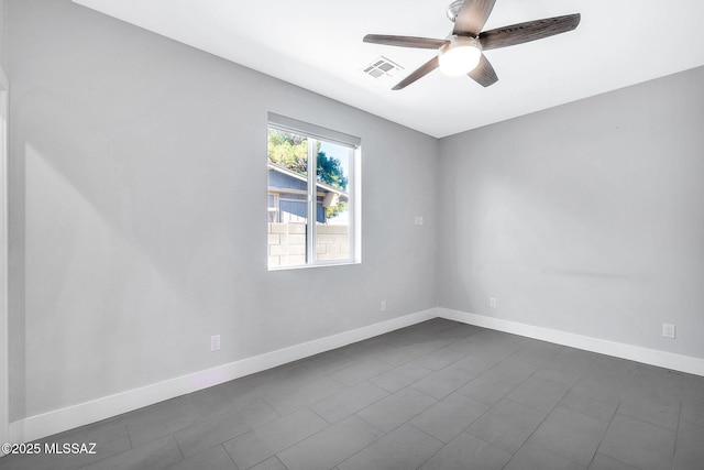 unfurnished room with ceiling fan