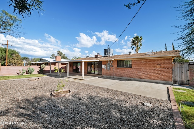 back of house featuring a patio area