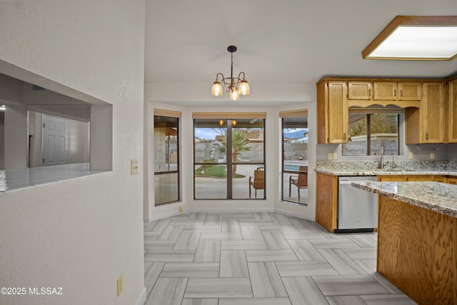 3873 W Allred St, Thatcher, AZ 85552 - kitchen featuring stainless steel dishwasher, light stone countertops, a sink, decorative light fixtures, and a chandelier